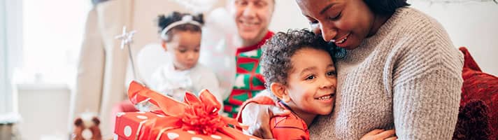 A family sat opening presents.